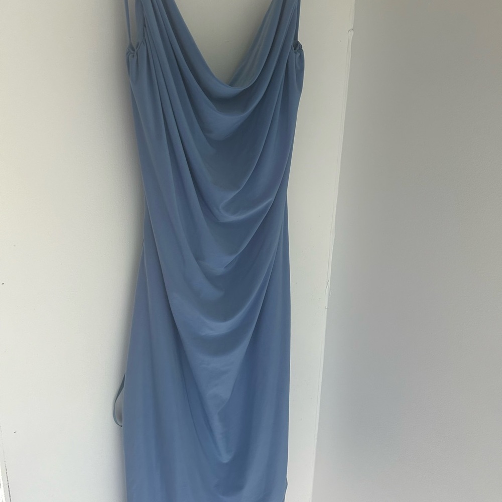 Saints dress NWT never been worn.
